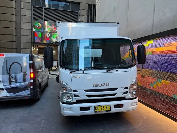 Isuzu pantech truck in a Sydney CBD loading laneway