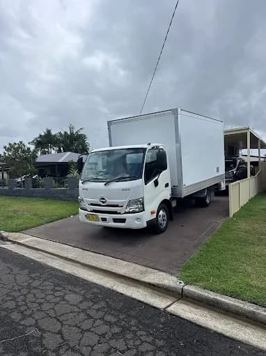 Hino pantech truck at a home ready for a removal